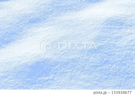 Fresh sparkling snow delicate blue close-up, perfect as a winter season background texture 133938677