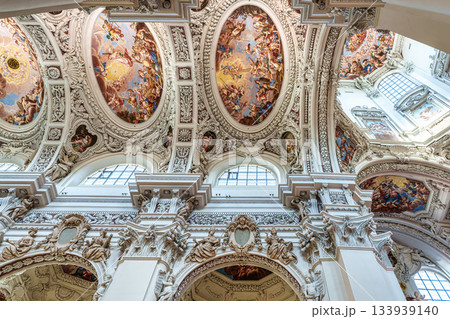 Passau, Germany - Apr 16, 2025: Interior of St. Stephans cathedral in Passau, Germany with famous organ pipes Passau, Germany - Apr 16, 2025: Interior of St. Stephans cathedral in Passau, Germany with famous organ pipes 133939140