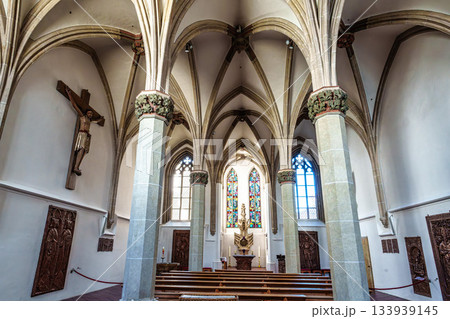 Passau, Germany - Apr 16, 2025: St. Stephans cathedral in Passau, Germany is an old white church with green metal domes Passau, Germany - Apr 16, 2025: St. Stephans cathedral in Passau, Germany is an old white church with green metal domes 133939145