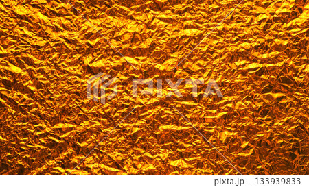 Abstract Texture of Crumpled Vibrant Gold Metallic Foil Background 133939833