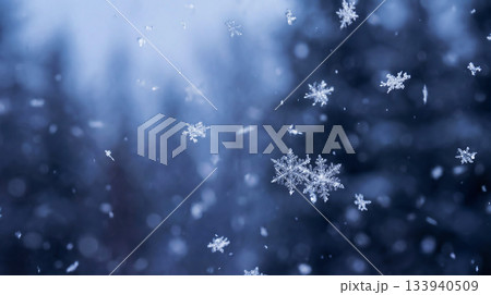 Snowflakes against a serene winter blue background 133940509