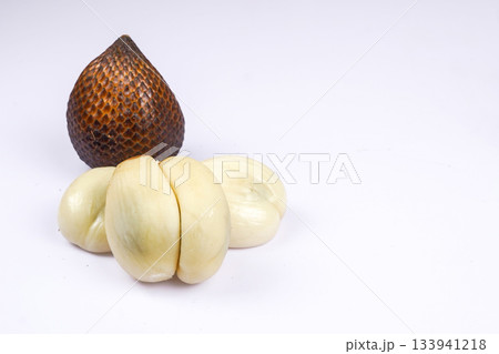 Fresh salak fruit or snake fruit with textured brown skin on white background Fresh salak fruit or snake fruit with textured brown skin on white background 133941218
