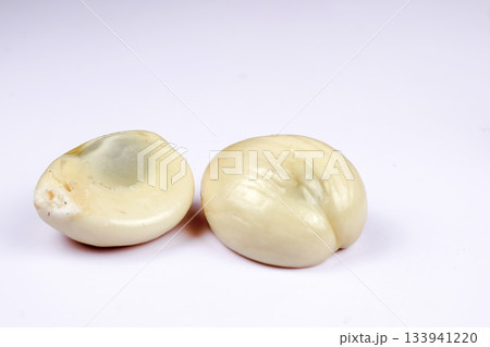 Fresh salak fruit or snake fruit with textured brown skin on white background 133941220