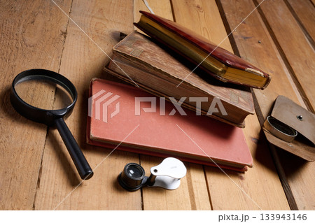 Old prayer books and reading magnifying glasses 133943146