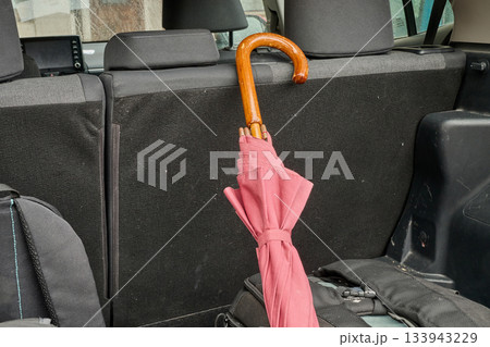 Outdoor. an umbrella in the car trunk Outdoor. an umbrella in the car trunk 133943229