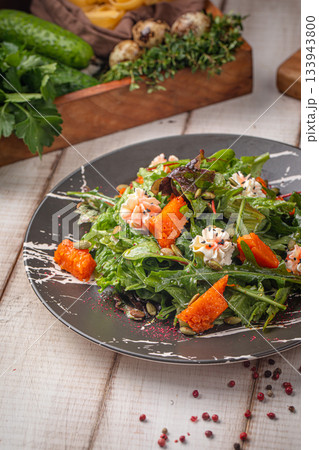 Fresh pumpkin salad with greens mix 133943800