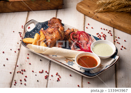 Grilled chicken wings with sauces plate 133943967