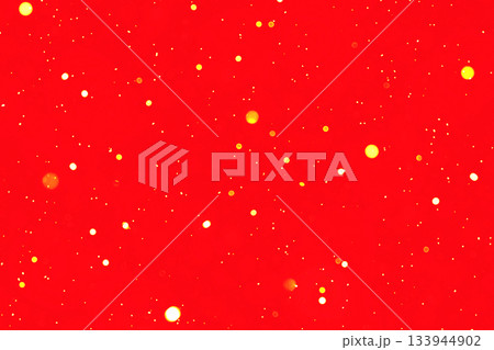 Vibrant red background with yellow bokeh dots creating a festive abstract texture Vibrant red background with yellow bokeh dots creating a festive abstract texture 133944902