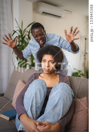 Young woman suffering domestic violence from her husband 133945388