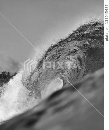 Close Perspective Revealing Textured Spray And Foam On Powerful Wave 133945487