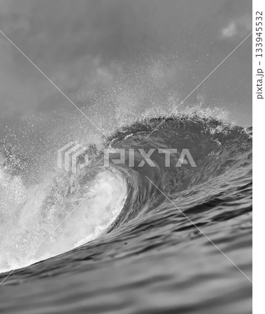 Close Perspective Revealing Textured Spray And Foam On Powerful Wave 133945532
