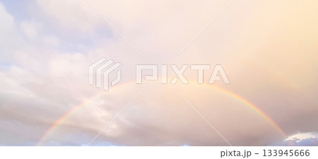 Rainbow Arch in Soft Sky Over Clouds, Pastel Light Creates Calm, Peaceful Outdoor Scene Rainbow Arch in Soft Sky Over Clouds, Pastel Light Creates Calm, Peaceful Outdoor Scene 133945666