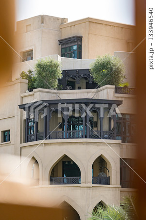 Sand colored building, Middle Eastern architecture. 133946540