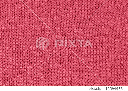 Closeup pink knit texture fabric pattern for cozy fashion and textile design 133946784
