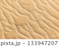 Sandy beach sand background with wave pattern, textures 133947207