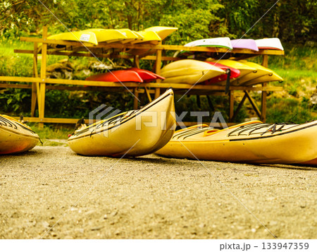Kayaks on water shore. Rental area Kayaks on water shore. Rental area 133947359