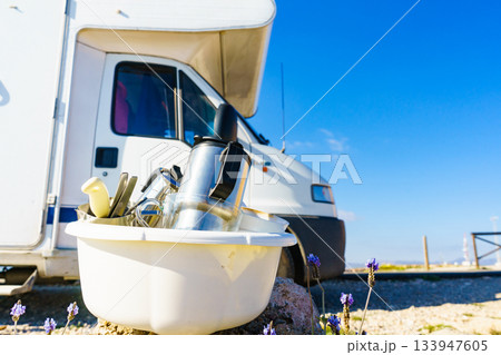 washing dishes in bowl, capming outdoor washing dishes in bowl, capming outdoor 133947605