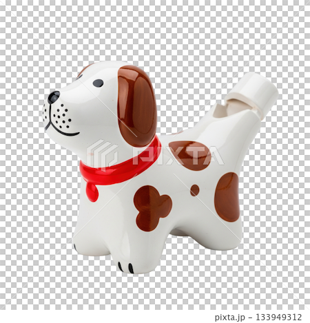 Ceramic dog whistle toy with brown spots and red collar standing as musical instrument 133949312
