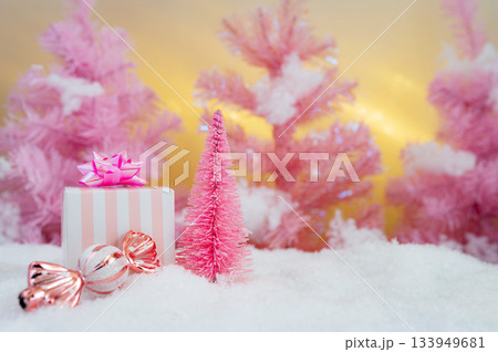 Pink Christmas Holiday Scene with Gifts Candy and Frosted Trees 133949681