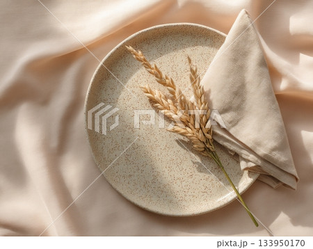 Minimal table setting with plate and dry stem Minimal table setting with plate and dry stem 133950170