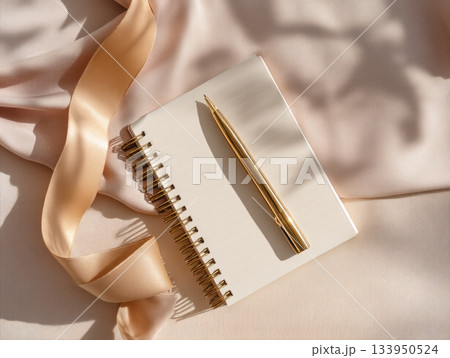 Minimal pastel planner layout with golden pen and silk ribbon Minimal pastel planner layout with golden pen and silk ribbon 133950524