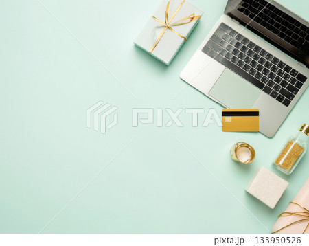 Creative workspace with laptop and pink accessories Creative workspace with laptop and pink accessories 133950526