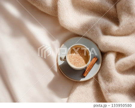 Cup of coffee with cinnamon stick 133950580