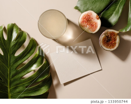 Tropical Mockup with Green Fig, Drink and Blank Card Tropical Mockup with Green Fig, Drink and Blank Card 133950744