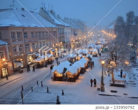 Snowy Christmas Market in Historic Town Square at Night Snowy Christmas Market in Historic Town Square at Night 133950792