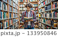 A student is surrounded on all sides by books in the library. 133950846