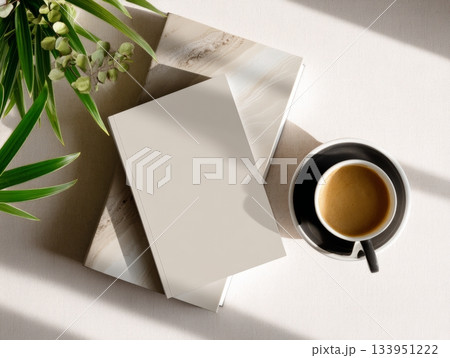 Minimal Open Magazine Mockup with Coffee and Greenery on White Desk 133951222