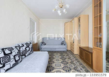 Stylish beige and gray decor, Wellarranged living room showcasing symmetry and sophistication design Stylish beige and gray decor, Wellarranged living room showcasing symmetry and sophistication design 133951579