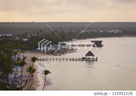 Beautiful beach in the Caribbean sea with smooth water at sunset 133952126
