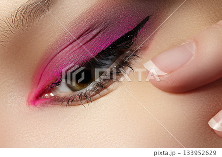 Closeup Macro of Woman Face with Pink Eyes Make-up. Fashion Celebrate Makeup. Beautiful Bright Magenta Make-up 133952629