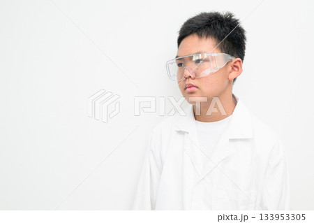 Young Asian Boy Dressed as Scientist with Lab Coat Thinking 133953305