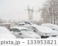 Vehicles Buried In Snow With Transmission Tower In Background 133953821