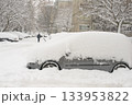 Vehicles Buried In Heavy Snow As Person Walks Along Winter Street 133953822