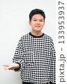 Asian Teenage Boy Studio Portrait on White Background Confused Shrugging 133953937