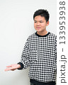 Asian Teenage Boy Studio Portrait on White Background Confused Shrugging 133953938