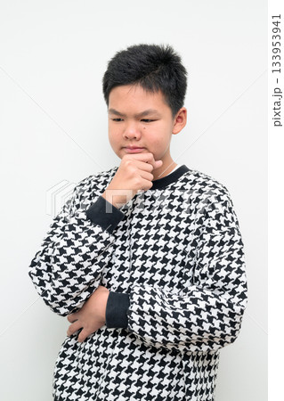 Asian Teenage Boy Studio Portrait on White Background Stressed Thinking Asian Teenage Boy Studio Portrait on White Background Stressed Thinking 133953941