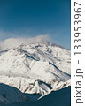 Snowy mountain landscape in Gudauri Georgia with clear skies and distant peaks 133953967