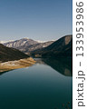 Winter view of Zhinvali Reservoir near Ananuri in Georgia with mountains and blue skies 133953986