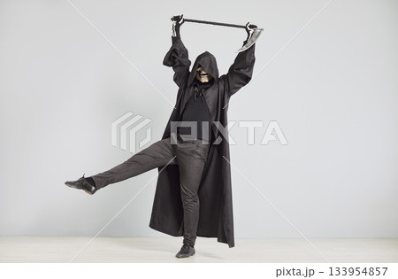 Grim Reaper Dancing At Halloween Party On Grey Background Grim Reaper Dancing At Halloween Party On Grey Background 133954857