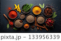 various spices on black stone background 133956339