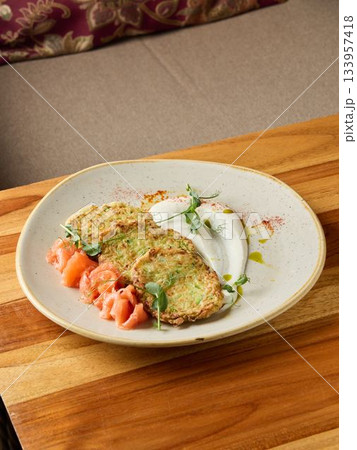 Delicious brunch presentation, Homemade dish with vegetable and fish ingredients displayed elegantly 133957418