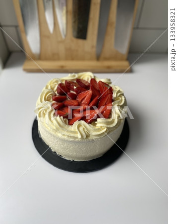 A delicious, fluffy cake with layers of rich flavor, perfect for any occasion. Often topped with frosting or fresh fruits, it's a sweet treat that brings joy to every bite. 133958321