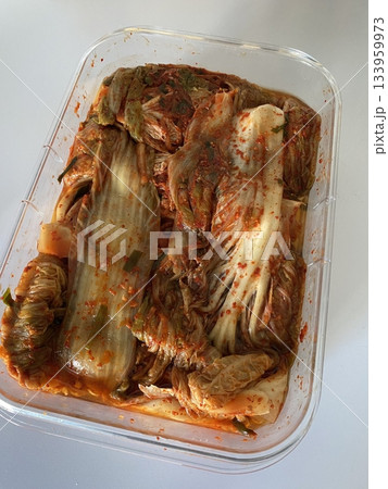 Traditional Korean kimchi, a spicy and tangy fermented cabbage dish with a blend of garlic, chili, and scallions. Known for its bold flavors and rich probiotic benefits. 133959973
