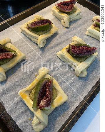 A croissant is a classic French pastry known for its buttery, flaky layers and golden crust. Often enjoyed plain or filled with chocolate, almond, or ham and cheese, it’s a perfect for breakfast 133961545