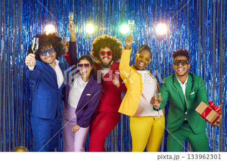 Portrait of multinational funny group of laughing happy cheerful people dressed in bright business suits Portrait of multinational funny group of laughing happy cheerful people dressed in bright business suits 133962301