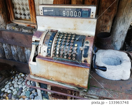 Vintage Cash Register Closeup in a Mountain Chalet Vintage Cash Register Closeup in a Mountain Chalet 133963748